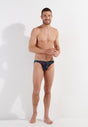 Full-body view of a men model wearing HO navy print modal/viscose/tencel Comfort Micro Briefs