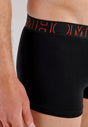 Close-up view of a men model wearing HO black/black print cotton Boxer Briefs 2p