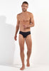 Full-body view of a men model wearing HO black  Comfort Briefs