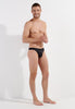 Full-body view of a men model wearing HO black  G-String
