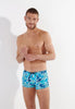 Front view of a men model wearing HO blue print  Swim Shorts
