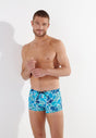 Front view of a men model wearing HO blue print  Swim Shorts