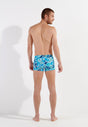General view of a men model wearing HO blue print  Swim Shorts