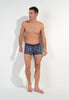 Full-body view of a men model wearing HO navy print  Boxer Briefs