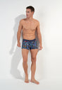 Full-body view of a men model wearing HO navy print  Boxer Briefs