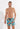 Front view of a men model wearing HO turquoise print  Beach Boxer
