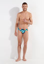 Full-body view of a men model wearing HO turquoise print  Swim Mini Briefs