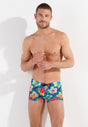 Front view of a men model wearing HO turquoise print  Swim Shorts