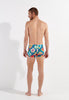 General view of a men model wearing HO turquoise print  Swim Shorts