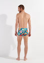 General view of a men model wearing HO turquoise print  Swim Shorts