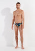Full-body view of a men model wearing HO navy print  Swim Mini Briefs