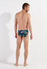 General view of a men model wearing HO navy print  Swim Mini Briefs
