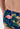 Close-up view of a men model wearing HO navy print  Swim Mini Briefs