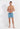 Full-body view of a men model wearing HO turquoise print  Beach Boxer