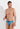 Front view of a men model wearing HO turquoise print  Swim Mini Briefs