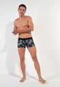 Full-body view of a men model wearing HO black print modal/viscose/tencel Trunk