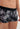 Close-up view of a men model wearing HO black print modal/viscose/tencel Trunk