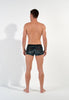 General view of a men model wearing HO black  Trunk