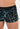 Close-up view of a men model wearing HO black  Trunk