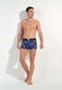 Full-body view of a men model wearing HO navy print  Boxer Briefs
