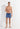 Full-body view of a men model wearing HO navy print  Beach Boxer