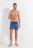 Full-body view of a men model wearing HO navy print  Beach Boxer