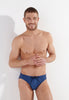 Front view of a men model wearing HO navy print  Swim Mini Briefs