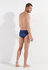 General view of a men model wearing HO navy print  Swim Mini Briefs
