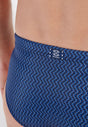 Close-up view of a men model wearing HO navy print  Swim Mini Briefs