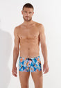 Front view of a men model wearing HO blue print  Swim Shorts