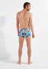 General view of a men model wearing HO blue print  Swim Shorts