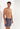 Front view of a men model wearing HO turquoise print  Beach Boxer