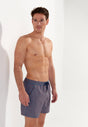 Front view of a men model wearing HO turquoise print  Beach Boxer
