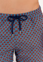 Close-up view of a men model wearing HO turquoise print  Beach Boxer