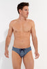 Front view of a men model wearing HO turquoise print  Swim Mini Briefs