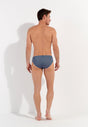 General view of a men model wearing HO turquoise print  Swim Mini Briefs