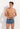 Front view of a men model wearing HO turquoise print  Swim Shorts