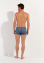 General view of a men model wearing HO turquoise print  Swim Shorts