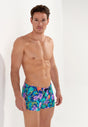 Front view of a men model wearing HO navy print  Swim Shorts