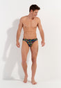 Full-body view of a men model wearing HO multico print  Comfort Micro Briefs