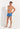 Full-body view of a men model wearing HO blue print  Swim Shorts