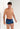 Front view of a men model wearing HO navy blue print  Trunk