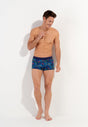 Full-body view of a men model wearing HO navy blue print  Trunk