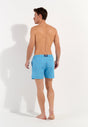 General view of a men model wearing HO turquoise print  Beach Boxer