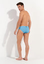 General view of a men model wearing HO turquoise print  Swim Mini Briefs