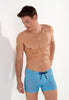 Front view of a men model wearing HO turquoise print  Swim Shorts