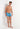 Full-body view of a men model wearing HO turquoise print  Swim Shorts