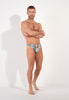 Full-body view of a men model wearing HO orange print  G-String