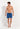 Full-body view of a men model wearing HO blue print  Beach Boxer