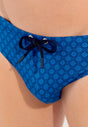 Close-up view of a men model wearing HO blue print  Swim Mini Briefs